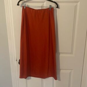 red satin skirt